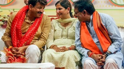 New Delhi, Jun 5 (ANI): Newly elected Bharatiya Janata Party (BJP) MPs Manoj Tiwari, Kamaljeet Sehrawat and Harsh Malhotra in conversation during the celebrations after their victory in the Lok Sabha elections, at the party office, in New Delhi on Wednesday. New Delhi, Jun 5 (ANI): Newly elected Bharatiya Janata Party (BJP) MPs Manoj Tiwari, Kamaljeet Sehrawat and Harsh Malhotra in conversation during the celebrations after their victory in the Lok Sabha elections, at the party office, in New Delhi on Wednesday.