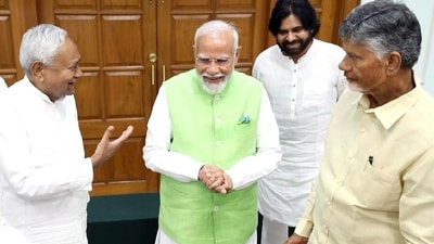 Narendra Modi with Bihar chief minister Nitish Kumar, Telugu Desam Party (TDP) chief N Chandrababu Naidu and Jana Sena Party chief Pawan Kalyan during the National Democratic Alliance (NDA) meeting, at his residence, 7, LKM, in New Delhi on Wednesday. (ANI)
