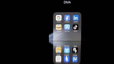 (FILES) This photo taken on February 12, 2023 in Brussels shows reflexions on a smartphone screen of logos of online platforms google, facebook, linkedin, Amazon, Apple store and Tiktok (Photo by Kenzo TRIBOUILLARD / AFP) (AFP) (FILES) This photo taken on February 12, 2023 in Brussels shows reflexions on a smartphone screen of logos of online platforms google, facebook, linkedin, Amazon, Apple store and Tiktok (Photo by Kenzo TRIBOUILLARD / AFP) (AFP)