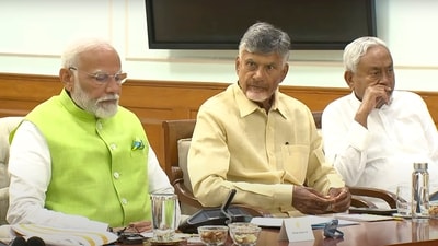 Prime Minister Narendra Modi with Telugu Desam Party leader N Chandrababu Naidu and Janata Dal (United) leader Nitish Kumar during a meeting. (AP)