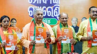 Odisha BJP president Manmohan Samal with party leaders release the party’s manifesto (ANI Photo) Odisha BJP president Manmohan Samal with party leaders release the party’s manifesto (ANI Photo)