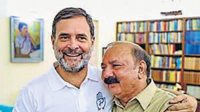 Rahul Gandhi with Kishori Lal Sharma (PTI) Rahul Gandhi with Kishori Lal Sharma (PTI)
