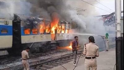 The burning train at Kiul railway station in Lakhisarai district of Bihar on Thursday. (PTI)