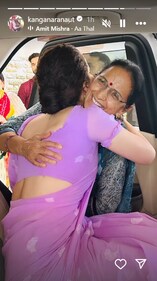Kangana Ranaut hugged her mother Asha Ranaut before heading to Delhi. Kangana Ranaut hugged her mother Asha Ranaut before heading to Delhi.