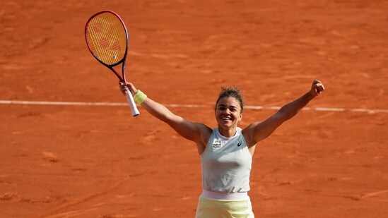 Italy's Jasmine Paolini celebrates as she won her semifinal match of the French Open tennis tournament against Russia's Mirra Andreeva (AP)