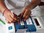 An electoral officer opens an Electronic Voting Machine (EVM) to display the number of votes at a counting center for the Lok Sabha Election on June 4 (HT Photo/Parveen Kumar) An electoral officer opens an Electronic Voting Machine (EVM) to display the number of votes at a counting center for the Lok Sabha Election on June 4 (HT Photo/Parveen Kumar)