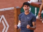 Carlos Alcaraz celebrates as he wins against Jannik Sinner. Carlos Alcaraz celebrates as he wins against Jannik Sinner.