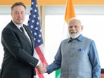 Prime Minister Narendra Modi shakes hand with Tesla chief executive Elon Musk during their meeting in New York City in 2023 (Reuters)