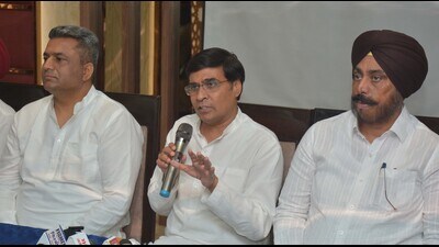(From left) BJP Mohali president Sanjeev Vashisht and BJP Anandpur Sahib candidate Subhash Sharma during a press conference in Mohali on Friday. (HT Photo)