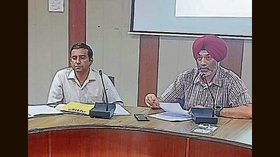 Additional deputy commissioner Anmol Singh Dhaliwal talking to other officials about the implementation of plantation drive in Ludhiana, on Friday. (HT) Additional deputy commissioner Anmol Singh Dhaliwal talking to other officials about the implementation of plantation drive in Ludhiana, on Friday. (HT)
