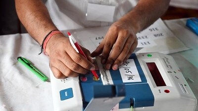 An electoral officer opens an Electronic Voting Machine (EVM) to display the number of votes at a counting center for the Lok Sabha Election on June 4 (HT Photo/Parveen Kumar) An electoral officer opens an Electronic Voting Machine (EVM) to display the number of votes at a counting center for the Lok Sabha Election on June 4 (HT Photo/Parveen Kumar)