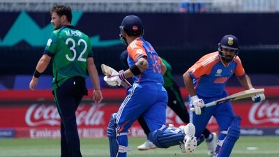 India's captain Rohit Sharma (R) and partner Virat Kohli (C) run between wickets to score against Ireland during the ICC men's Twenty20 World Cup 2024 group A cricket match between India and Ireland (AFP) India's captain Rohit Sharma (R) and partner Virat Kohli (C) run between wickets to score against Ireland during the ICC men's Twenty20 World Cup 2024 group A cricket match between India and Ireland (AFP)