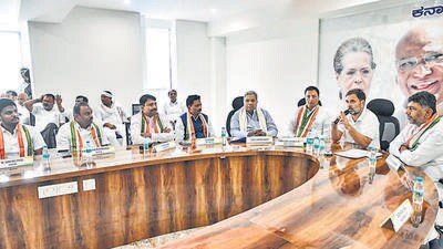 Congress' newly elected MP from Wayanad and Raebareli Rahul Gandhi holds a meeting with party leaders at the Congress Bhavan in Bengaluru on Friday. Karnataka CM Siddaramaiah and State Dy CM DK Shivakumar also seen. (ANI) Congress' newly elected MP from Wayanad and Raebareli Rahul Gandhi holds a meeting with party leaders at the Congress Bhavan in Bengaluru on Friday. Karnataka CM Siddaramaiah and State Dy CM DK Shivakumar also seen. (ANI)