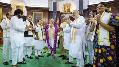 Prime Minister Narendra Modi after he was elected as the leader of the NDA Parliamentary Party, at Samvidhan Sadan, in New Delhi, Friday (PTI) Prime Minister Narendra Modi after he was elected as the leader of the NDA Parliamentary Party, at Samvidhan Sadan, in New Delhi, Friday (PTI)