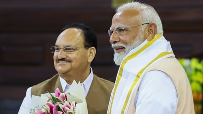 Prime Minister Narendra Modi being welcomed by BJP President JP Nadda at the NDA Parliamentary Party meeting at Samvidhan Sadan, in New Delhi, Friday (PTI) Prime Minister Narendra Modi being welcomed by BJP President JP Nadda at the NDA Parliamentary Party meeting at Samvidhan Sadan, in New Delhi, Friday (PTI)