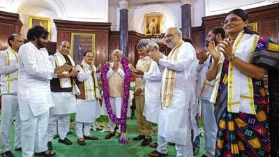 Prime Minister Narendra Modi being garlanded by Telugu Desam Party (TDP) chief N Chandrababu Naidu during the National Democratic Alliance (NDA) meeting,at Samvidhan Sadan in New Delhi on Friday. (BJP/ANI) Prime Minister Narendra Modi being garlanded by Telugu Desam Party (TDP) chief N Chandrababu Naidu during the National Democratic Alliance (NDA) meeting,at Samvidhan Sadan in New Delhi on Friday. (BJP/ANI)