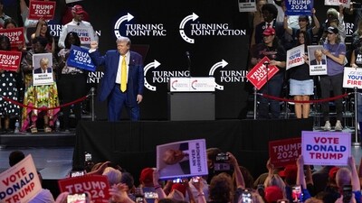 Former US President and 2024 Republican presidential candidate Donald Trump raises his fist as he walks off stage after participating in a town hall event at Dream City Church in Phoenix, Arizona, on June 6, 2024. (Photo by Jim WATSON / AFP) (AFP) Former US President and 2024 Republican presidential candidate Donald Trump raises his fist as he walks off stage after participating in a town hall event at Dream City Church in Phoenix, Arizona, on June 6, 2024. (Photo by Jim WATSON / AFP) (AFP)