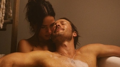 Glen Powell and Adria Arjona in a still from Hit Man. Glen Powell and Adria Arjona in a still from Hit Man.