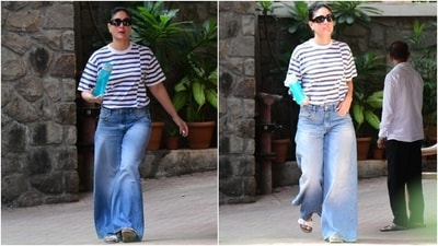 The paparazzi clicked Kareena outside her residence in Mumbai. The pictures show her greeting the media as she enters her home. She chose the classic tee and denim jeans combination, a go-to look for many, as she arrived home after a day outing in the bay. (HT Photo/Varinder Chawla) The paparazzi clicked Kareena outside her residence in Mumbai. The pictures show her greeting the media as she enters her home. She chose the classic tee and denim jeans combination, a go-to look for many, as she arrived home after a day outing in the bay. (HT Photo/Varinder Chawla)