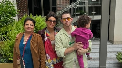 (L-R) Madhu Chopra, Priyanka Chopra, Nick Jonas and Malti Marie Chopra Jonas pose for the camera. (L-R) Madhu Chopra, Priyanka Chopra, Nick Jonas and Malti Marie Chopra Jonas pose for the camera.