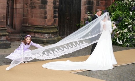 Olivia Henson arrives for her wedding to Hugh Grosvenor, the Duke of Westminster at Chester Cathedral, in Chester, England, Friday June 7, 2024. (AP) Olivia Henson arrives for her wedding to Hugh Grosvenor, the Duke of Westminster at Chester Cathedral, in Chester, England, Friday June 7, 2024. (AP)