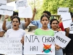 Students protest against the alleged irregularities in NEET UG 2024 results and demand re-examination, in Prayagraj on Saturday.