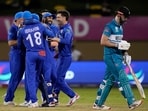 Players of Afghanistan's celebrate the dismissal of New Zealand's Daryl Mitchell. Players of Afghanistan's celebrate the dismissal of New Zealand's Daryl Mitchell.