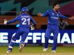 Afghanistan's captain Rashid Khan celebrates the wicket of New Zealand's Mark Chapman Afghanistan's captain Rashid Khan celebrates the wicket of New Zealand's Mark Chapman