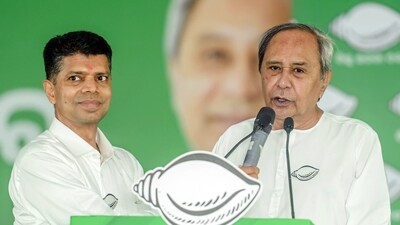 Odisha Chief Minister Naveen Patnaik along with VK Pandian (File Photo/ANI) Odisha Chief Minister Naveen Patnaik along with VK Pandian (File Photo/ANI)