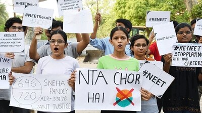 Students protest against the alleged irregularities in NEET UG 2024 results and demand re-examination, in Prayagraj on Saturday. (ANI) Students protest against the alleged irregularities in NEET UG 2024 results and demand re-examination, in Prayagraj on Saturday. (ANI)