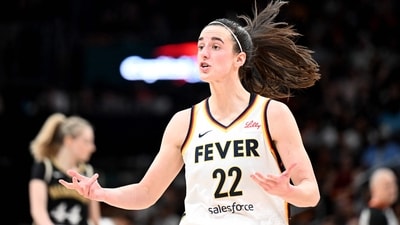WASHINGTON, DC - JUNE 07: Caitlin Clark #22 of the Indiana Fever reacts to a call in the fourth quarter against the Washington Mystics at Capital One Arena on June 07, 2024 in Washington, DC. (Getty Images via AFP) WASHINGTON, DC - JUNE 07: Caitlin Clark #22 of the Indiana Fever reacts to a call in the fourth quarter against the Washington Mystics at Capital One Arena on June 07, 2024 in Washington, DC. (Getty Images via AFP)
