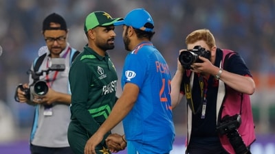 Pakistan's Babar Azam shakes hands with India's Rohit Sharma after India vs Pakistan match in Ahmedabad (REUTERS)
