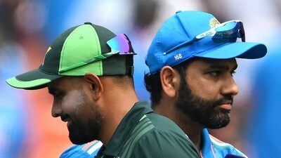India's captain Rohit Sharma (R) and his Pakistan counterpart Babar Azam. (AFP)