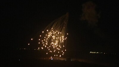 (FILES) An Israeli strike illuminates the sky above the southern Lebanese village of Khiam late on April 17, 2024, amid ongoing cross-border tensions as fighting continues between Israel and Hamas militants in the Gaza Strip.(Photo by Rabih DAHER / AFP) (AFP) (FILES) An Israeli strike illuminates the sky above the southern Lebanese village of Khiam late on April 17, 2024, amid ongoing cross-border tensions as fighting continues between Israel and Hamas militants in the Gaza Strip.(Photo by Rabih DAHER / AFP) (AFP)