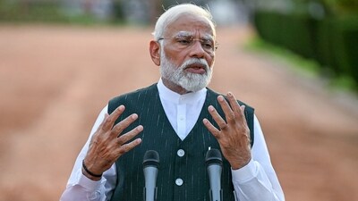 Prime Minister Narendra Modi gives a speech after staking claim to form the new union government as he was elected for his third term following the country's general election. (AFP) Prime Minister Narendra Modi gives a speech after staking claim to form the new union government as he was elected for his third term following the country's general election. (AFP)