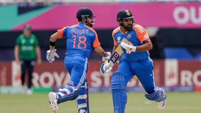India's captain Rohit Sharma, right, and partner Virat Kohli run between wickets to score against Ireland during an ICC Men's T20 World Cup cricket match at the Nassau County International Cricket Stadium in Westbury, New York (PTI) India's captain Rohit Sharma, right, and partner Virat Kohli run between wickets to score against Ireland during an ICC Men's T20 World Cup cricket match at the Nassau County International Cricket Stadium in Westbury, New York (PTI)