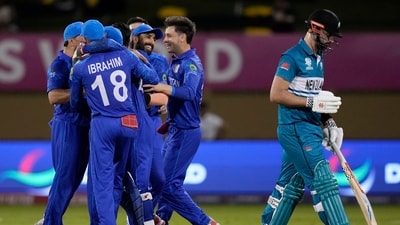Players of Afghanistan's celebrate the dismissal of New Zealand's Daryl Mitchell. (PTI) Players of Afghanistan's celebrate the dismissal of New Zealand's Daryl Mitchell. (PTI)