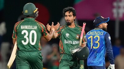 Bangladesh's Tanzim Hasan and teammate Mahmudullah, left, react following the men's T20 World Cup cricket match between Sri Lanka and Bangladesh at Grand Prairie Stadium, Grand Prairie, Texas, Friday, June 7 (PTI) Bangladesh's Tanzim Hasan and teammate Mahmudullah, left, react following the men's T20 World Cup cricket match between Sri Lanka and Bangladesh at Grand Prairie Stadium, Grand Prairie, Texas, Friday, June 7 (PTI)