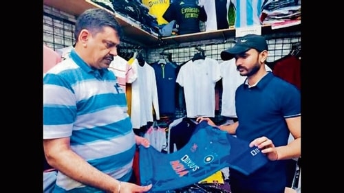 Shopkeepers in Palika Bazar have reported a rise in demand for Team India jerseys. (Photo: Manvi Singh/HT (Photo for representational purposes)) Shopkeepers in Palika Bazar have reported a rise in demand for Team India jerseys. (Photo: Manvi Singh/HT (Photo for representational purposes))