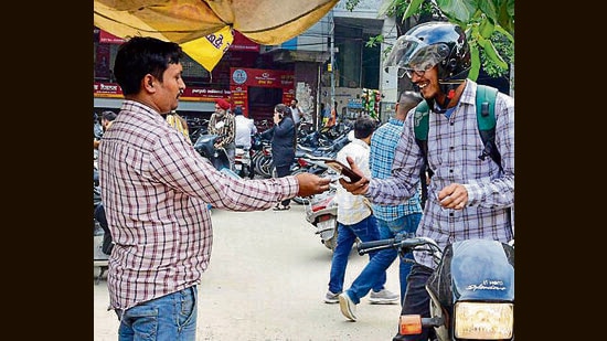Residents allege that they are being overcharged at the parking lots in Ludhiana. (Manish/HT)