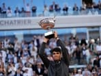 Winner Spain's Carlos Alcaraz celebrates with the trophy as he won the men's final match of the French Open tennis tournament against Germany's Alexander Zverev at the Roland Garros stadium in Paris Winner Spain's Carlos Alcaraz celebrates with the trophy as he won the men's final match of the French Open tennis tournament against Germany's Alexander Zverev at the Roland Garros stadium in Paris