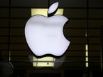 FILE - The Apple logo is illuminated at a store in the city center in Munich, Germany FILE - The Apple logo is illuminated at a store in the city center in Munich, Germany