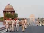 Delhi Police personnel patrol Raisina Hill ahead of the swearing-in ceremony. (Arvind Yadav/HT Photo) Delhi Police personnel patrol Raisina Hill ahead of the swearing-in ceremony. (Arvind Yadav/HT Photo)