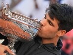Spain's Carlos Alcaraz kisses the trophy after winning the men's final of the French Open tennis tournament against Germany's Alexander Zverev at the Roland Garros stadium in Paris, France, Sunday, June 9 Spain's Carlos Alcaraz kisses the trophy after winning the men's final of the French Open tennis tournament against Germany's Alexander Zverev at the Roland Garros stadium in Paris, France, Sunday, June 9