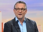 In this undated photo provided by the BBC on Sunday, June 9, 2024, doctor and broadcaster Michael Mosley speaks on Sunday with Laura Kuenssberg. Police said that a body believed to be that of missing British TV presenter Michael Mosley was found on a Greek island Sunday morning. A police spokesman, who spoke on condition of anonymity because of an ongoing investigation, said the body was found on a rocky coast by a private boat and that formal identification was pending. (Jeff Overs/BBC via AP)