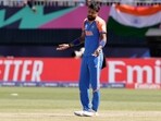 Hardik Pandya reacts after dismissing Pakistan's Shadab Khan during the ICC Men's T20 World Cup cricket match between India and Pakistan, Hardik Pandya reacts after dismissing Pakistan's Shadab Khan during the ICC Men's T20 World Cup cricket match between India and Pakistan,