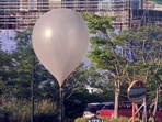 A balloon believed to have been sent by North Korea, carrying various objects including what appeared to be trash, is pictured at a park in Incheon, South Korea,