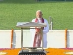PM-elect Narendra Modi pays tribute at Rajghat ahead of his oath