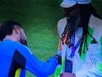 Virat Kohli signed Chris Gayle's blazer during the IND vs PAK clash. Virat Kohli signed Chris Gayle's blazer during the IND vs PAK clash.