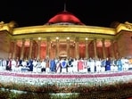 Narendra Modi news highlights: President Droupadi Murmu and Vice President Jagdeep Dhankhar pose for a group picture with the newly sworn-in Prime Minister Narendra Modi and his Cabinet Ministers during a ceremony, at Rashtrapati Bhavan, in New Delhi on Sunday.